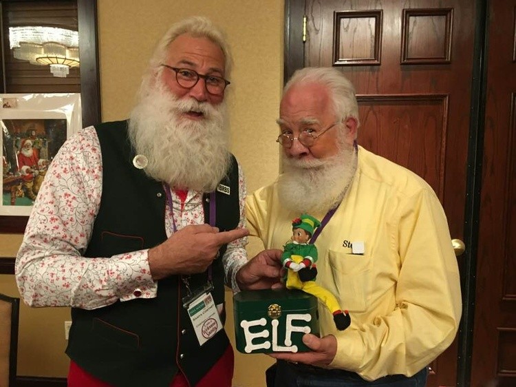red sled santa and elf