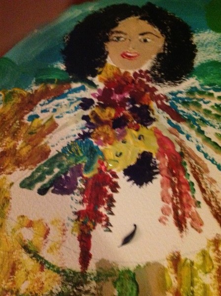 Little girl holding bouquet of flowers