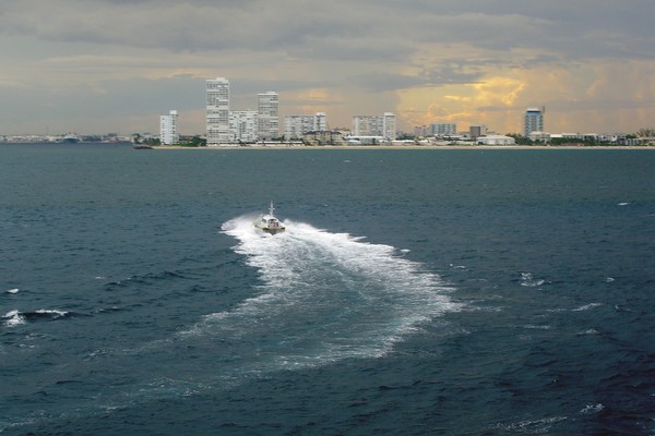 Tug Boat Heading Ashore