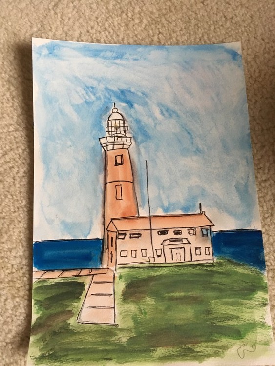 A lighthouse by the sea