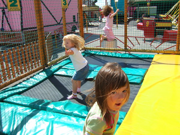 claire and abbie having fun at the fairground