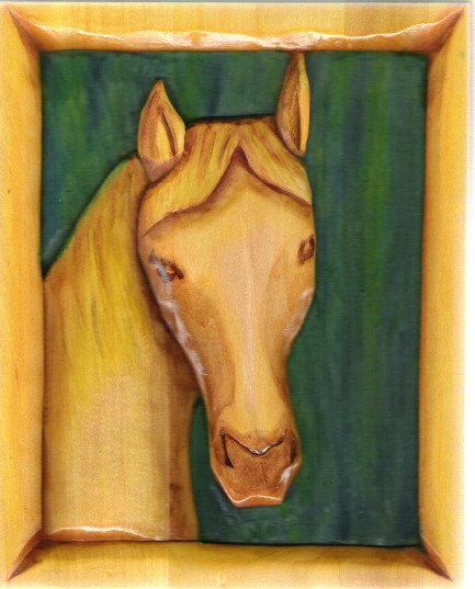Horse's head wood relief