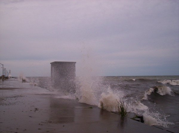 Waves Crashing Against Dock