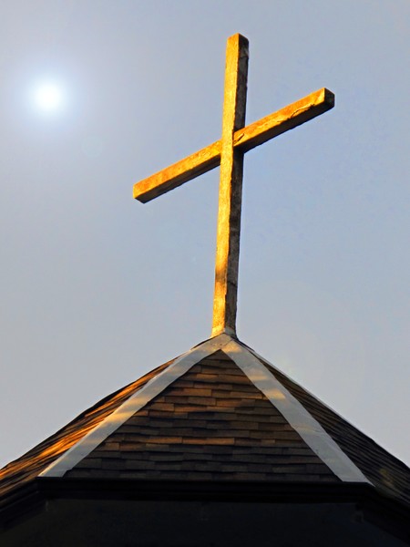 Cross on a Roof Top