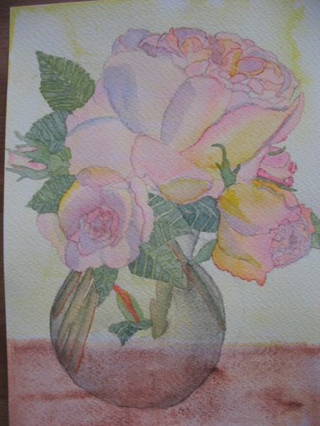 vase of pink and light yellow roses