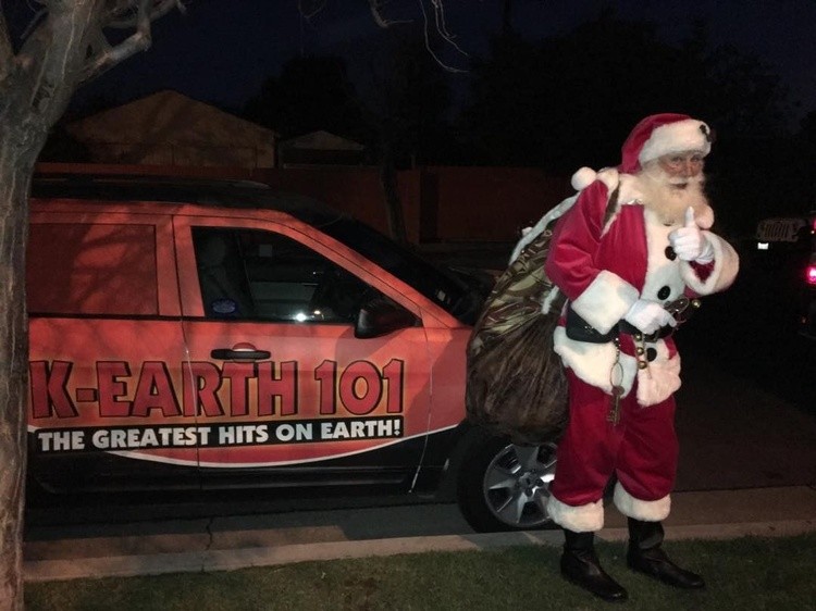 red sled santa with gift packs