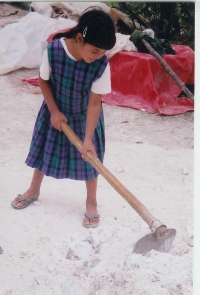Little Girl Making Lime, Honduras