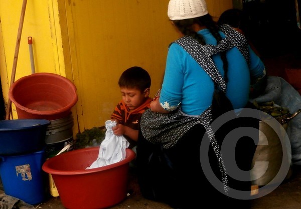 Ayudando a si Mama'