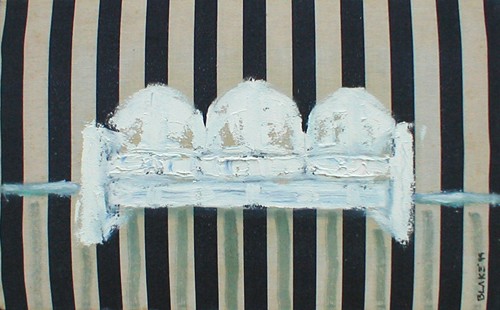 White Couch with Striped Wallpaper