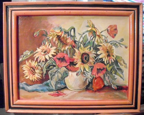 Still life with sunflowers and poppies