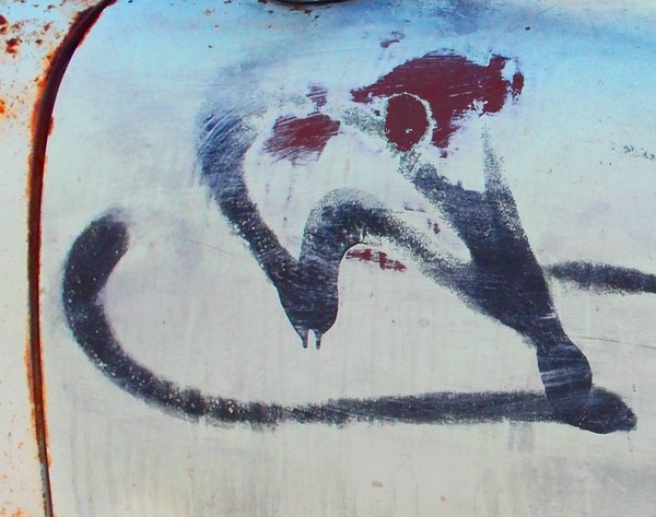 paint and rust on an old car