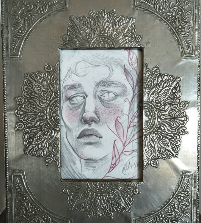 Sad boy in a funky frame 