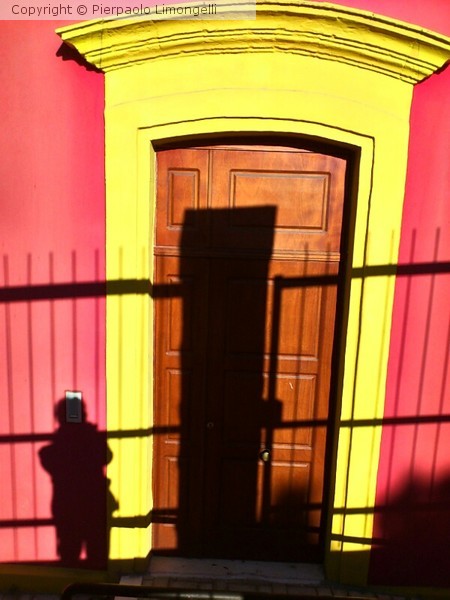 shadow on the red building