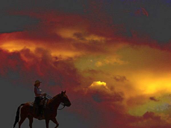 She Rides The Ridges At Sunset