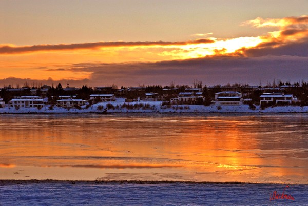 Golden light falls on the frozen bay !