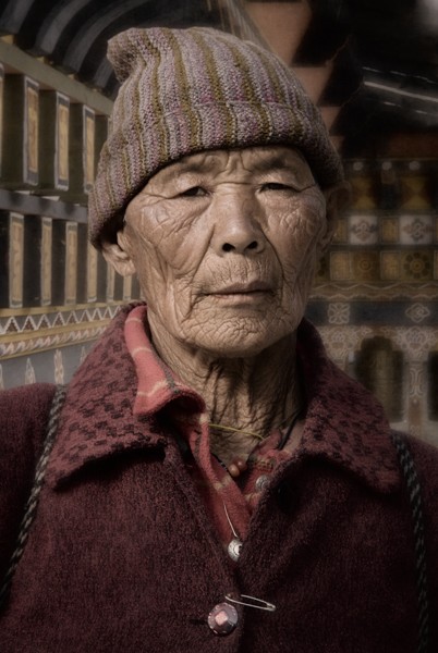 Woman by the Prayer Wheels