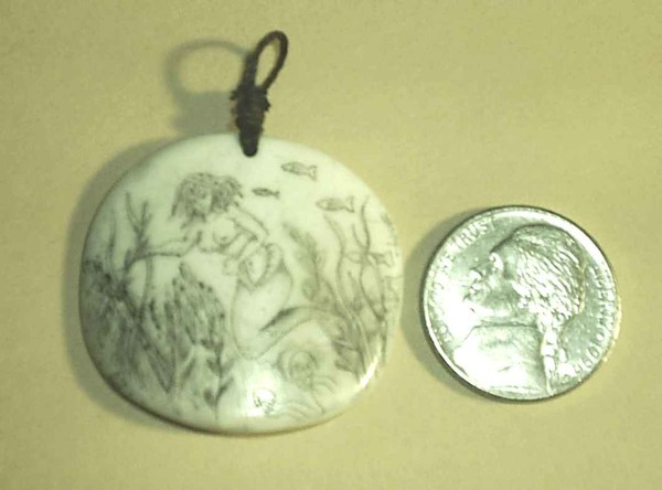 Mermaid underwater, Scrimshaw on Bone