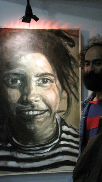 Artist with his painting