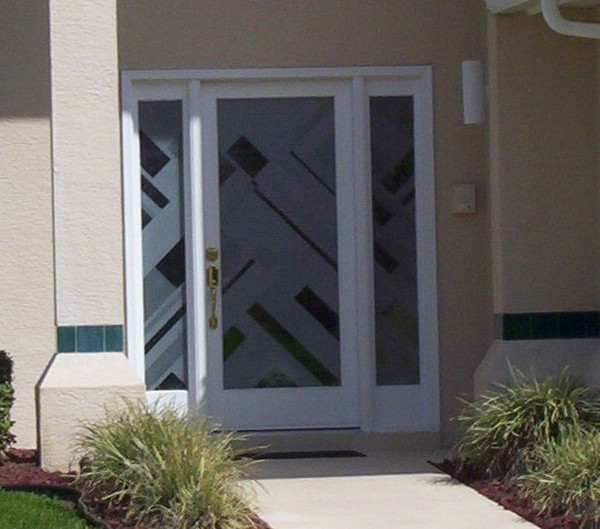 front entry, deep carved art deco