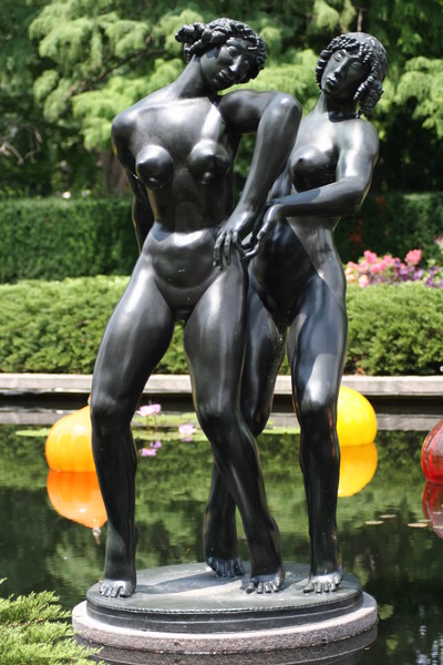 Twin Statues with Dale Chihuly's orbs