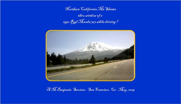 Mt Shasta thru the window of a moving car.