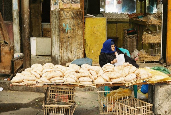 Old Shoubra Woman selling Bread