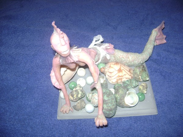 Manamals-fish woman