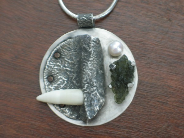 Sterling Silver Pendant (Determination)