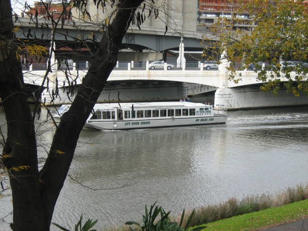 Boat under bridge