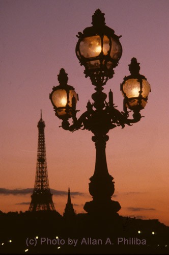 Sunset. Bridge Lamp and Eiffel Tower