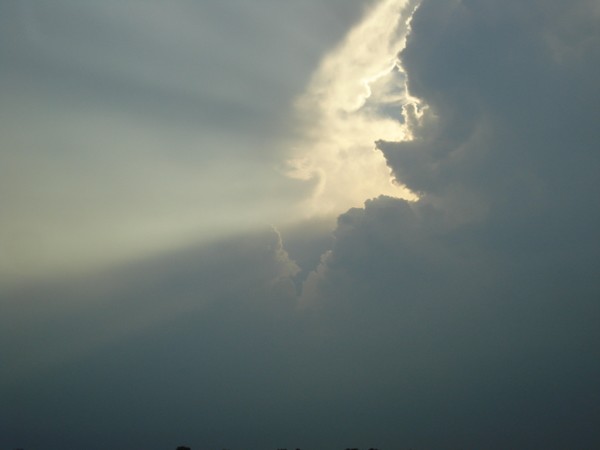 Sun Bursting Through Storm Clouds