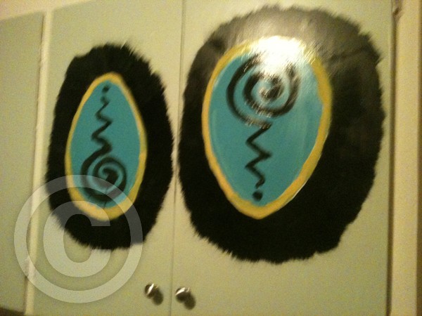E.G.2 symbols on Cabinet