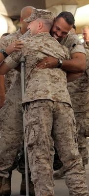 A Marine Greets His Friends Home....