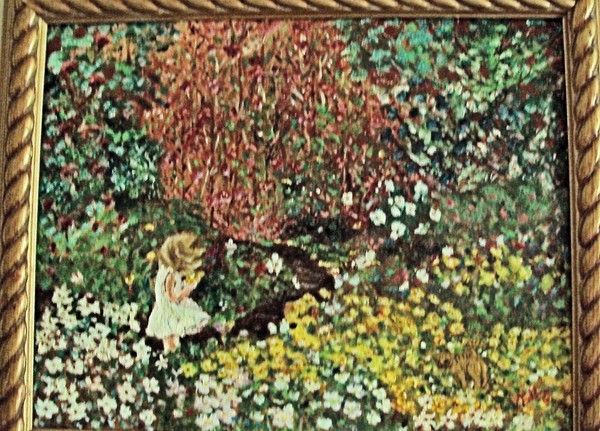 Little girl in a field of flowers