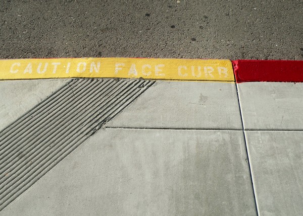 Caution- Face Curb