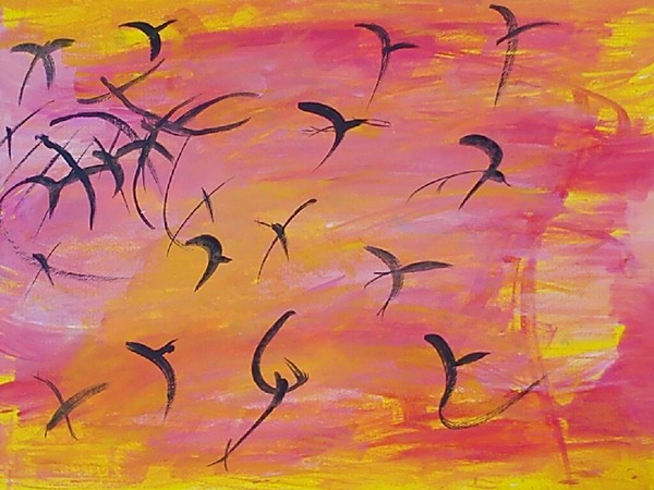 Birds in a sunset