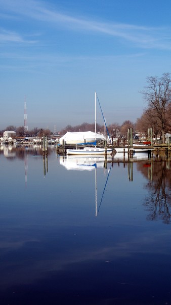 Reflection Of A Sailboat