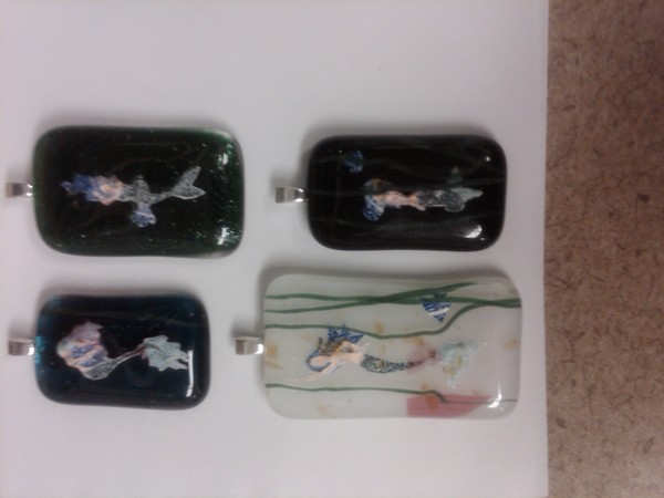 mermaids in fused glass