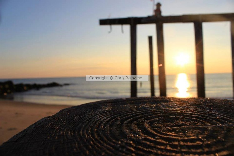 Sunrise over remains of Pier. OG, NJ