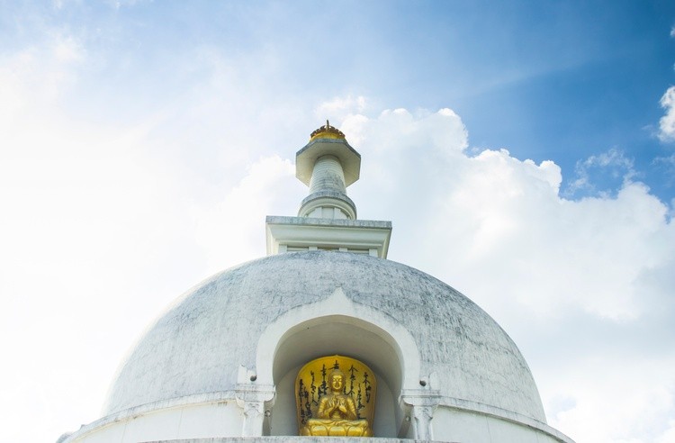 Buddha stupa in blue sky