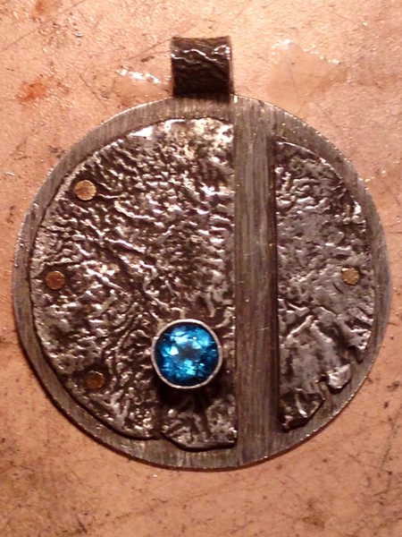 Reticulated sterling silver pendant w blue Topaz