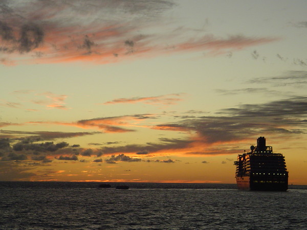 Cruise Ship And Sunset