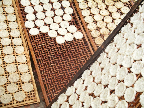 Rice cakes drying - Laos