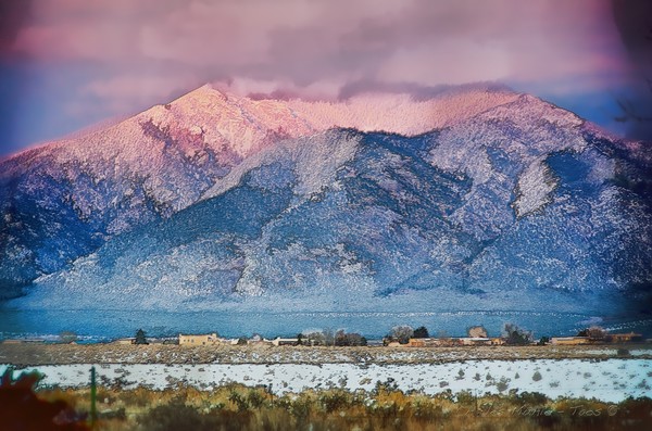 Pink sunset on Taos mountain
