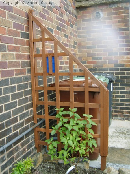 Bin screen trellis with House number