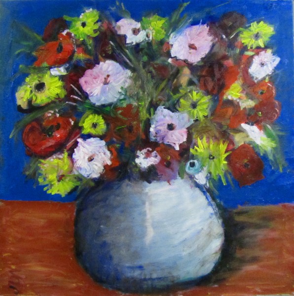 flowers in round blue vase