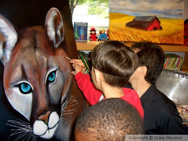 School Helping Paint Mascot