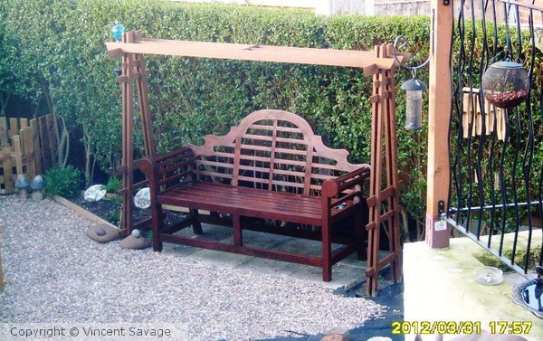 Lutyen's bench and Oriental style trellis