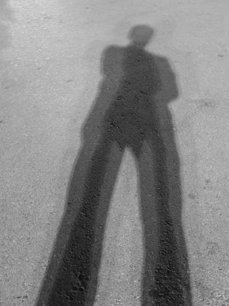 Small man, long shadow