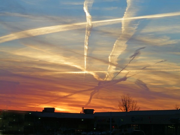 Sunset with Contrails